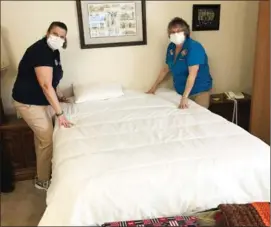  ?? PHOTOS Provided ?? Deb Shock and Brenda Moreno, two of our housekeepe­rs, are ready to help clean your apartment and make your bed. Just one of the many services we have to offer at Miller’s Senior Living Community in Plymouth.