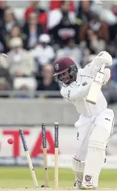  ?? FILE ?? The bails fly as Windies’ batsman Shai Hope is bowled by England’s Toby RolandJone­s during day three of the day-night Test match between England and the West Indies, at Edgbaston in Birmingham, England, Saturday, August 19, 2017.