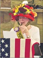  ??  ?? Heritage of Green Hills resident Deborah McCone takes part in a celebratio­n of the 100th anniversar­y of women getting the right to vote.