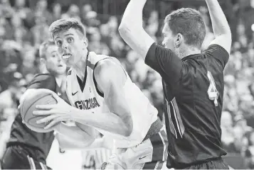  ?? JAMES SNOOK, USA TODAY SPORTS ?? Gonzaga freshman center Zach Collins is averaging 10.2 points and 5.7 rebounds in 17.1 minutes per game. He hopes to help the Bulldogs go deep in the NCAA tournament.
