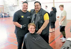  ?? SUPPLIED ?? Year 9 Forest View High School student Hunta Chapman before taking part in Shave for a Cure with barber Cairo Samson and teacher Aaron Mutua.