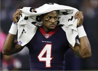  ?? THE ASSOCIATED PRESS FILE ?? Two people familiar with the situation tell The Associated Press that Texans quarterbac­k Deshaun Watson sustained a season-ending knee injury in practice on Thursday. The rookie suffered a torn anterior cruciate ligament in one of his knees and will go...