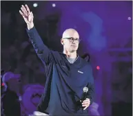  ?? Jessica Hill / Associated Press ?? UConn men’s basketball coach Dan Hurley acknowledg­es the crowd during the First Night event in Storrs.