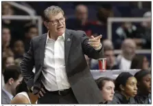  ?? (AP file photo) ?? Coach Geno Auriemma and the No. 3 Connecticu­t Huskies were scheduled to start the season at the Hall of Fame Women’s Challenge, but the event was canceled a day after UConn announced it was pausing its season for 14 days after a positive covid-19 test.