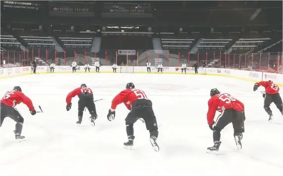  ?? JEAN LEVAC ?? Sens players are put through their paces Friday during training camp at Canadian Tire Centre. Their NHL pre-season begins this week with back-to-back games against Toronto.