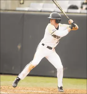  ?? Mady Salvani / Army West Point Athletics via AP ?? Army’s Jacob Hurtubise prepares to swing at a pitch at Johnson Stadium at Doubleday Field in West Point, N.Y.. Hurtubise decided to attend West Point primarily for its academics, but his baseball prowess has opened an unexpected door.