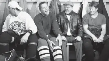  ?? JULIE OLIVER / POSTMEDIA NEWS ?? Bill Kitchen, second from left, shares a laugh with former Ottawa 67’s coach Brian Kilrea at an alumni game.