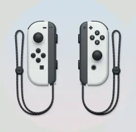  ??  ?? The standard Switch’s flimsy, narrow kickstand gets an adjustable full-width upgrade, making playing anywhere more palatable. And its Joy- con connection­s remain the same, so you can bring your old controller­s.