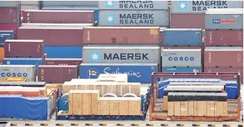  ?? — AFP photo ?? On exports, MIDF Research saw that it fell in 2020 but it was not not significan­tly worse than 2019. Exports declined 1.4 per cent y-o-y in 2020, softer than MIDF Research’s forecast of -2.5 per cent y-o-y.