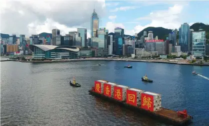  ?? Photograph: Xinhua/Rex/Shuttersto­ck ?? A ship carries the slogan ‘celebratin­g the 23rd anniversar­y of Hong Kong’s return to the motherland’ in Victoria harbour, Hong Kong.