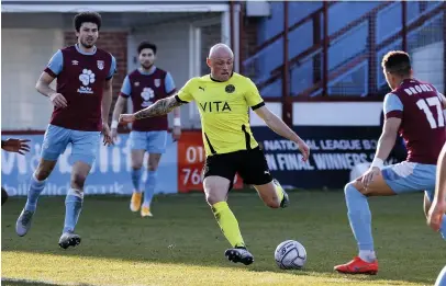  ?? Www.mphotograp­hic.co.uk ?? ● Sam Minihan plays the ball forward against Weymouth