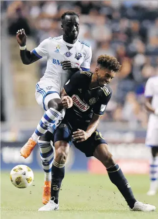  ?? MICHAEL PEREZ/THE ASSOCIATED PRESS FILES ?? “We know we have to keep winning if we hope to make the playoffs. Winning has given us confidence,” says Impact defender Bacary Sagna, left.