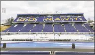  ?? Stephen Whyno / Associated Press ?? Workers finish up work on Navy-Marine Corps Memorial Stadium Friday, in Annapolis, Md., for Saturday’s outdoor NHL game between the Toronto Maple Leafs and Washington Capitals.