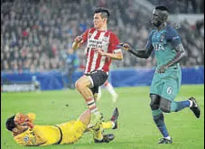 ?? AFP PHOTO ?? Tottenham goalkeeper Hugo Lloris (left) was shown the red card for a rash tackle on PSV’S Hirving Lozan (centre).