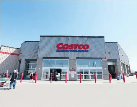  ?? MICHELLE BERG ?? A temporary water line to the Costco Wholesale store was completed late Sunday and should be operationa­l in a day or two, the city said.