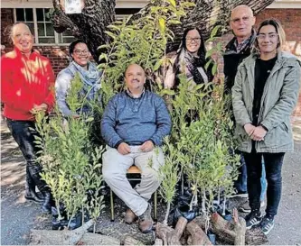  ?? | SUPPLIED ?? STAFF at the Centre for Conservati­on Education gear up to mark Arbor Week.