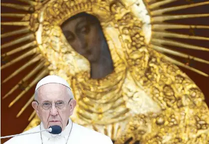  ?? REUTERS ?? Pope Francis speaks at the Gate of Dawn shrine in Vilnius, Lithuania on Saturday.