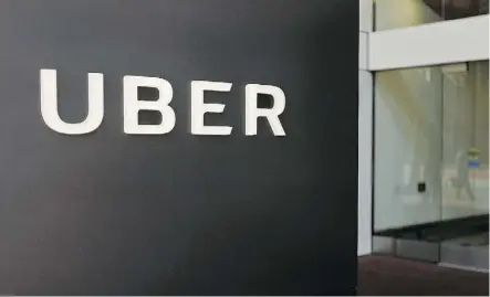  ?? ERIC RISBERG/AP FILES ?? Ride-hailing company Uber revealed that a year-old hack compromise­d the data of 57 million Uber riders. The informatio­n stolen included names, email addresses and mobile phone numbers.