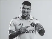  ?? Inter Miami ?? U.S. national team defender DeAndre Yedlin, who joins Inter Miami this season, models the new pink jersey.