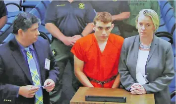  ??  ?? Judge orders Florida shooting suspect, Nikolas Cruz (middle), to be held in jail without bond.