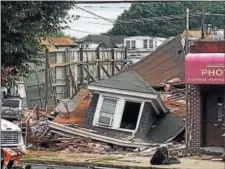  ?? BILL MURRAY -- THE TRENTONIAN ?? An occupied dwelling collapsed early Monday morning on Broad St in Hamilton.