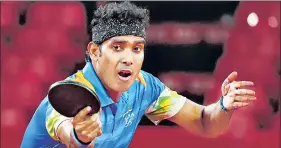  ?? REUTERS ?? Sharath Kamal in action against Ma Long in their third round match on Tuesday.