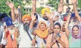  ?? SAMEER SEHGAL/HT ?? Sikh pilgrims before leaving for Pakistan, in Amritsar on Thursday.