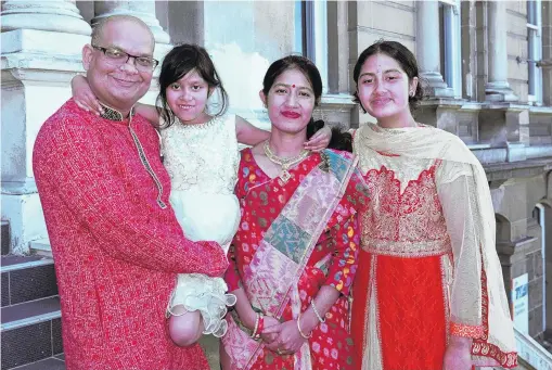  ?? PHOTO: LINDA ROBERTSON ?? Special day . . . Bangladesh­born family members (from left) Shyamal Das, Shuchi Das, Shubhra Sinha and Shreya Das at the Dunedin Municipal Chambers yesterday.