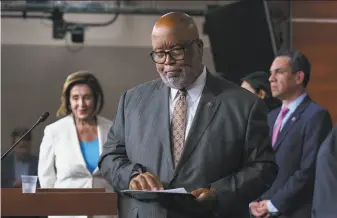  ?? J. Scott Applewhite / Associated Press ?? Rep. Bennie Thompson, DMiss., is flanked by California Democratic Reps. Nancy Pelosi and Pete Aguilar after being appointed to the panel investigat­ing the capitol riot on Jan. 6.