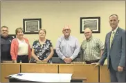  ?? / Dee Decker ?? Walker County Superinten­dent of Schools Damon Raines, right, stands with School Board members (from left) Bobby McNabb, Phyllis Hunter, Karen Stoker, Dale Wilson, and Mike Carruth.