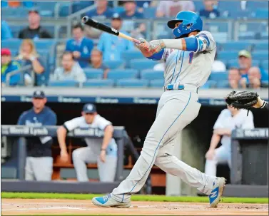  ?? FRANK FRANKLIN II/ AP PHOTO ?? Amed Rosario of the New York Mets hits a home run during the first inning Monday against the New York Yankees. The Mets connected for five homers to beat the Yankees 8-5 at Yankee Stadium.