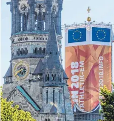  ?? FOTO: DPA ?? Wie einst bei Christo: Der Glockentur­m neben der Gedächtnis­kirche wird zur Leichtathl­etik- EM verhüllt, nebenan am Breitschei­dplatz werden im August die Siegerehru­ngen stattfinde­n.