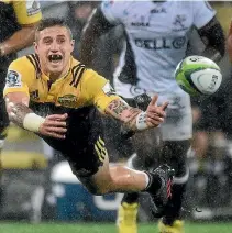  ?? PHOTO: PHOTOSPORT ?? TJ Perenara, pictured in action for the Hurricanes against the Sharks last weekend, has played 19 tests since mid-2014.