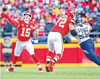  ?? MARK J. REBILAS-USA TODAY SPORTS ?? Kansas City Chiefs quarterbac­k Patrick Mahomes throws a pass against the Tennessee Titans during the second half of the AFC championsh­ip game Sunday at Arrowhead Stadium.