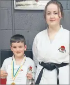  ?? ?? Junior student of the week Dylan Coyle pictured with Sensei Alison Hennessy after the junior session.