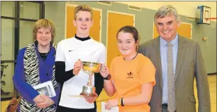  ??  ?? Siobhan Chambers and Ryan Boyle were presented with the trophy by Rosemary and Duncan MacPhee.