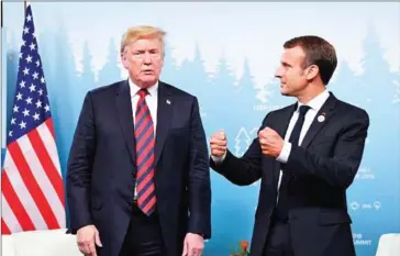  ?? SAUL LOEB/AFP ?? President Trump with French President Emmanuel Macron in Quebec on June 8.