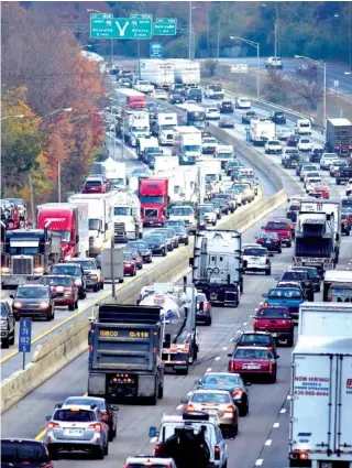  ?? STAFF FILE PHOTO BY ROBIN RUDD ?? Both the eastbound, right, and the westbound lanes of Interstate 24, as seen from Missionary Ridge, are congested in this November photo.