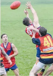 ??  ?? Ash Bridges attempts to mark for Buln, but is spoiled by Longwarry’s Jake Patching, who helped his side to a 30 point win.