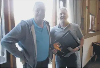  ?? ?? Cuckfield Golf Society secretary Jimmy Stakim with winner Andy Goldsmith
