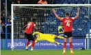  ?? Photograph: Martin Rickett/PA ?? Elijah Adebayo’s penalty hits the outside of the post.