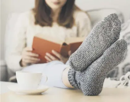  ??  ?? 0 Putting your feet up with a good book can be a welcome distractio­n in troubled times, says Fiona Hyslop