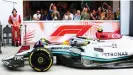  ?? 1/Getty Images ?? Fans watch with phones at the ready as Lewis Hamilton makes a pitstop in his Mercedes Petronas W13 at the Miami Grand Prix earlier this year. Photograph: Dan Istitene/ Formula