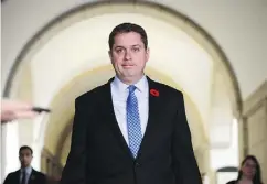  ?? SEAN KILPATRICK / THE CANADIAN PRESS ?? Tory Leader Andrew Scheer forced out MP Tony Clement after more allegation­s of sexual impropriet­y surfaced.