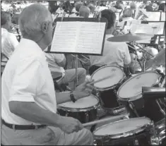  ??  ?? KEEP THE BEAT: Hot Springs Concert Band members will perform the last show of their 2015 Summer Concert Series under the direction of Craig V. Hamilton on Monday in Whittingto­n Park.