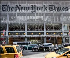  ?? AVALON — UNIVERSAL IMAGES GROUP ED/GETTY IMAGES ?? The New York Times building on the west side of Midtown Manhattan in New York on July 8, 2017.