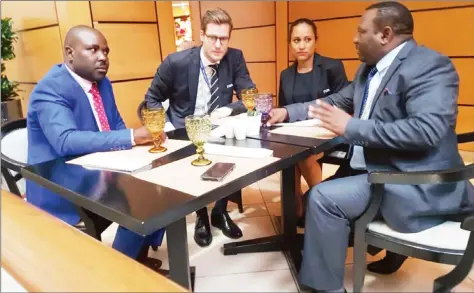  ??  ?? HEAVYWEIGH­T COMPANY ... ZIFA vice president Omega Sibanda (right) stresses a point to FIFA manager (national associatio­ns) Luca Nicola (second from left) at a meeting the country’s football leadership, which included the Associatio­n board member in...