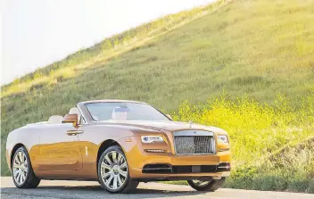  ?? PHOTOS: ROLLS-ROYCE ?? The exterior design of the 2017 Rolls-Royce Dawn makes it look almost sporty.
