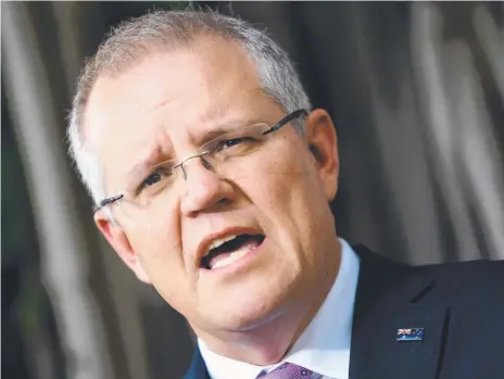  ??  ?? Prime Minister Scott Morrison issuing national flag lapel pins to his Cabinet ministers has been pounced on by the self-loathers.