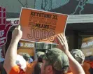  ?? ?? A man demonstrat­es for the Keystone XL pipeline in Lincoln, Neb., in 2011.